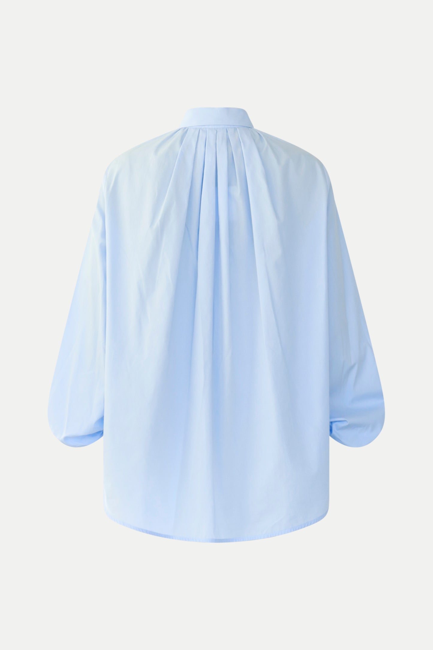 Hellblaue Bluse mit Ballonärmeln